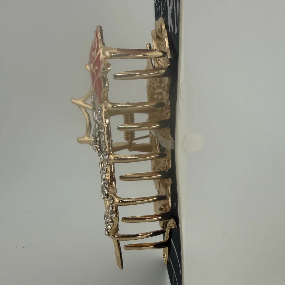 Nicole Miller Gold-Tone Crystal Skull Hair Claw Clip with Red Rose and Web